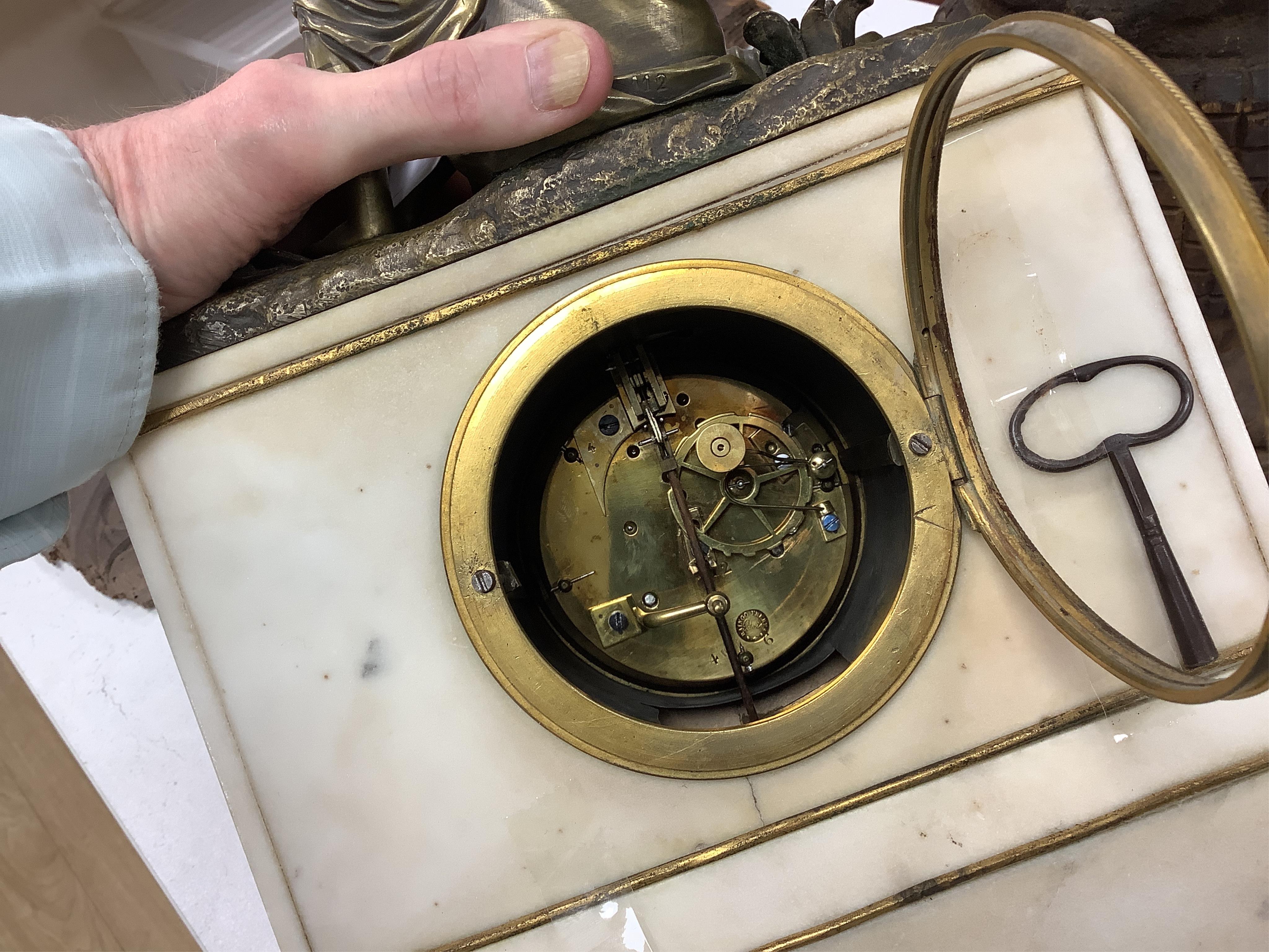 A late 19th century French bronze figural mounted marble mantel clock, 34cm